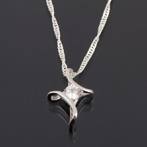 Jewelry - Cross necklace with center stone!